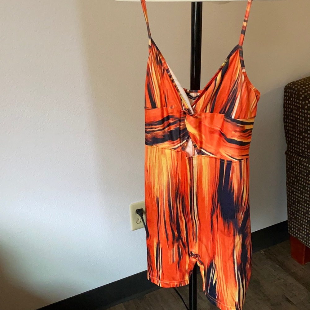 Shein orange multi color jumpsuit size M